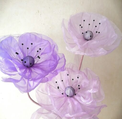 image of a 3 Lilac Blooms on a Metal Stand