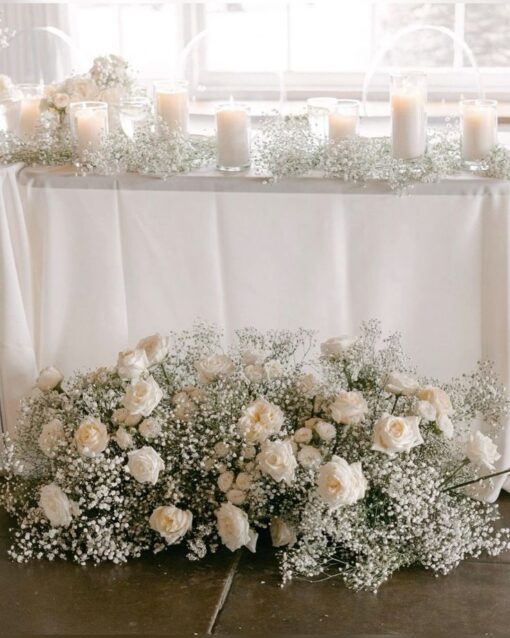 image of Baby breath & roses arrangement